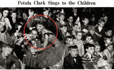 Petula sings to the children